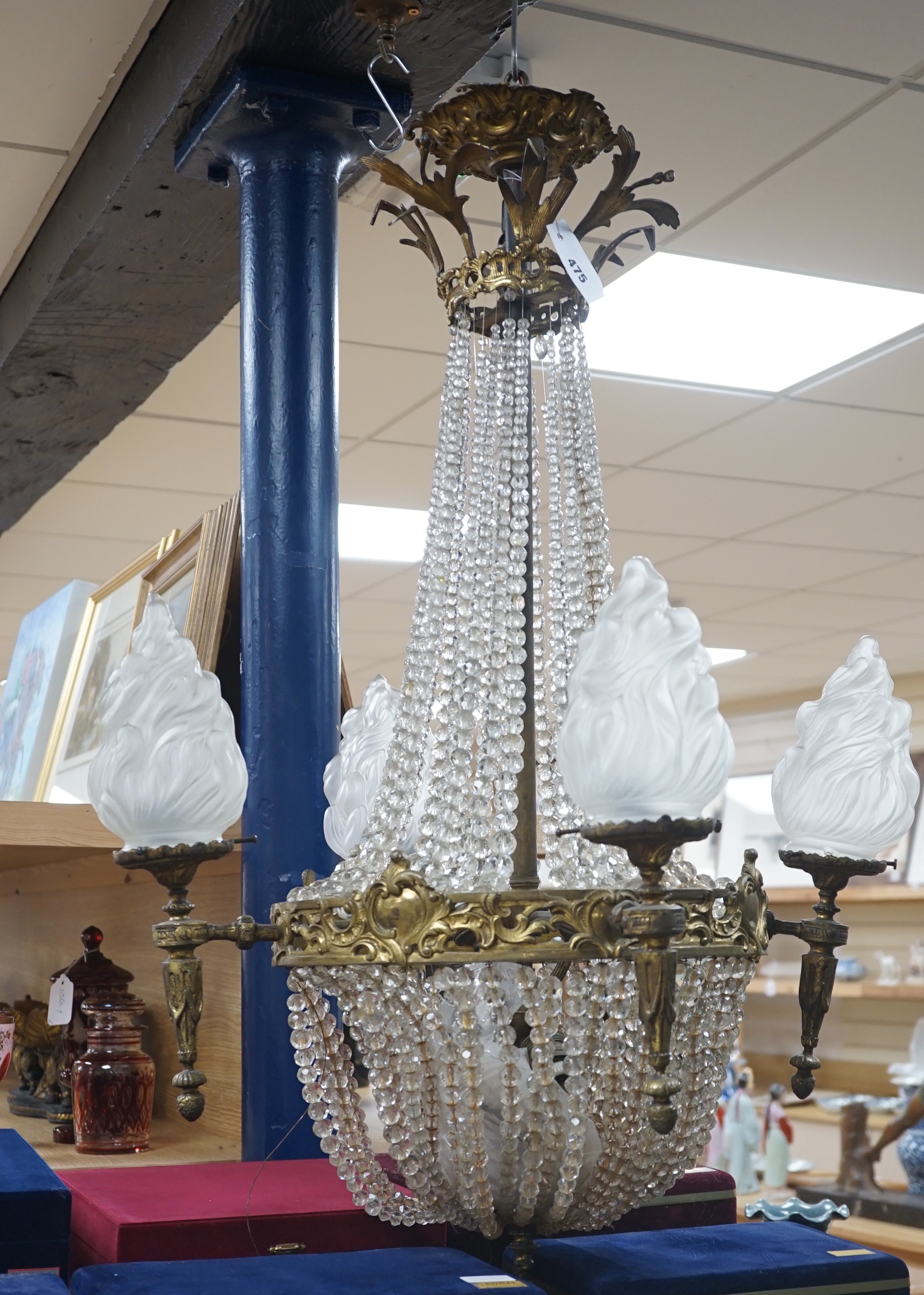 A French gilt Empire style cut glass and brass chandelier, 95cm high